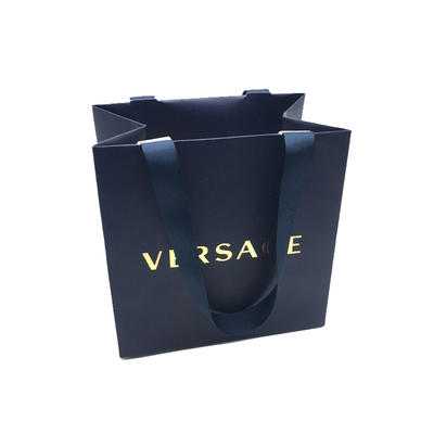 Wholesale luxury design paper carrier packaging bags with handles